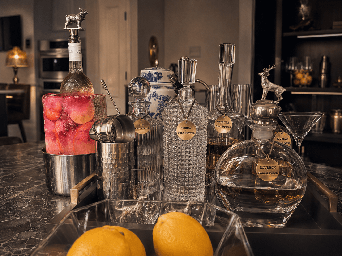 Crystal decanters and barware with Pond & Perch tags, set for a signature pour.