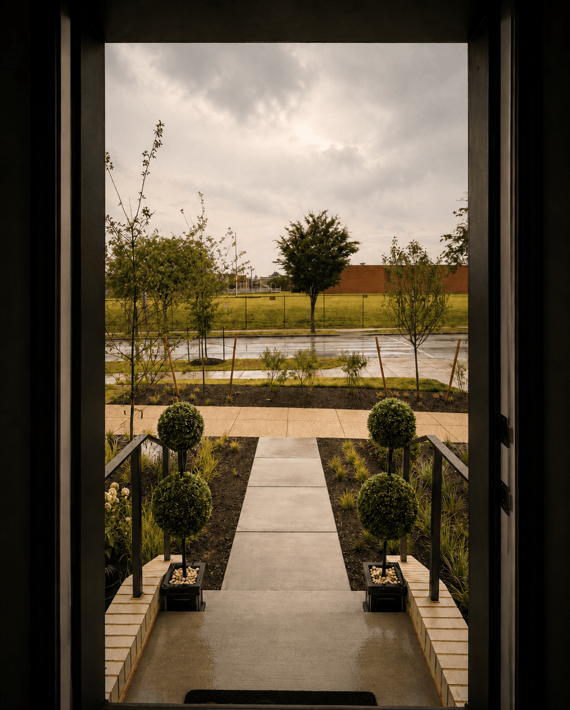 The open front door at Pond & Perch, looking out toward the entry path.